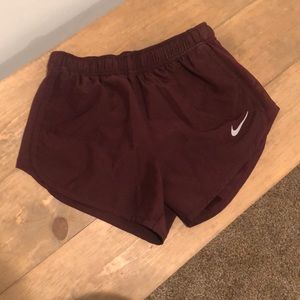 Nike dry fit maroon running shorts, women’s XS